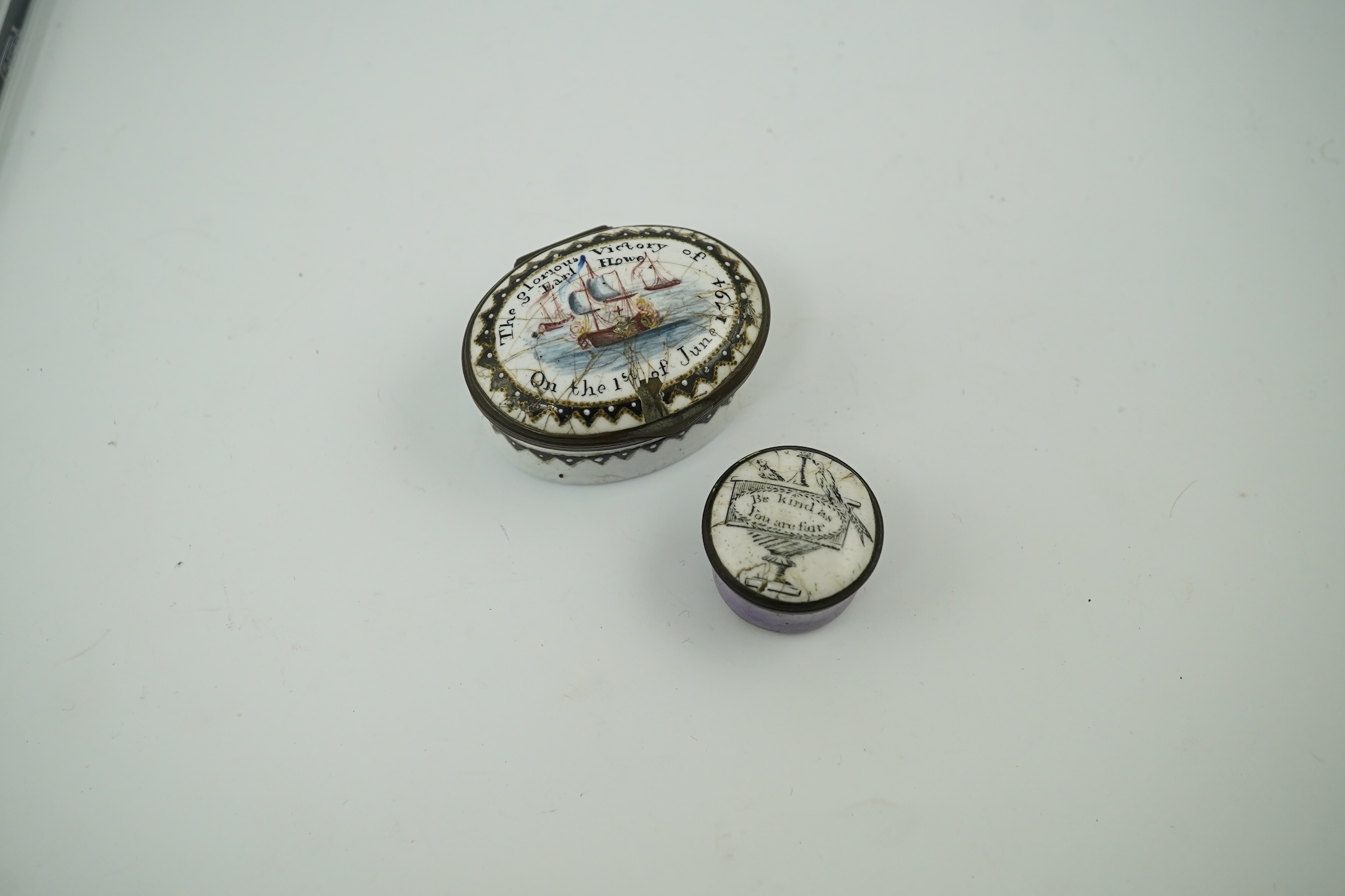 Two 18th century South Staffordshire enamel patch boxes, one inscribed 'The Glorious Victory, Earl Howe, on the 1st of June 1794', the other 'Be Kind as You are Fair', largest 5cm wide. Condition - enamel chipped